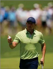  ?? AP PHOTO BY SUE OGROCKI ?? Rory Mcilroy, of Northern Ireland, waves after making a putt on the first hole during the first round of the PGA Championsh­ip golf tournament, Thursday, May 19, 2022, in Tulsa, Okla.