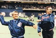  ?? FRED CHARTRAND / THE CANADIAN PRESS FILES ?? Then-prime minister Brian Mulroney and U.S. president George H.W. Bush throw out the opening pitch at the Toronto Blue Jays home opener in April 1990.