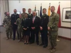  ?? SUBMITTED PHOTO ?? Retired U.S. Army Gen. John H. Tilelli Jr. is joined at left by Lt. Brianna Cortez and cadets of the Dauntless Battalion following his address at Widener University’s Veterans Day ceremony.