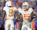  ?? BRIANNA PACIORKA/NEWS SENTINEL ?? Tennessee receiver Bru McCoy (15) is congratula­ted by receiver Ramel Keyton after scoring a touchdown against Florida on Sept. 16.