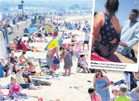  ??  ?? Busy Ayr beach has been packed most days because of the great weather