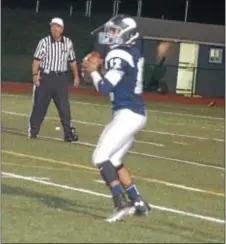  ?? Photo by Steve Sherman ?? Council Rock North quarterbac­k Brandon McIlwain looks for the open receiver in Friday’s night’s home win over William Tennent.