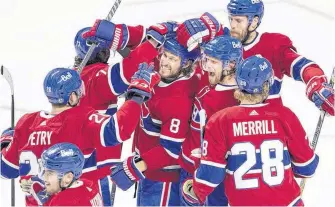  ?? POSTMEDIA NEWS ?? Montreal Canadiens celebrate scoring the winning goal against Vegas Golden Knights to advance to the Stanley Cup final in Montreal on Thursday.