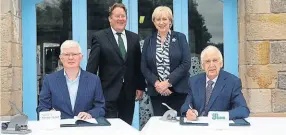  ?? PHOTO: WATERWAYS IRELAND ?? At the contract signing for Phase 2 of the Ulster Canal redevelopm­ent are: WI chief executive John McDonagh and MD of Jons Civil Engineerin­g, John Pentony, observed by Minister for Housing, Local Government and Heritage, Darragh O’Brien TD and Minister for Rural and Community Developmen­t, Heather Humphreys TD.