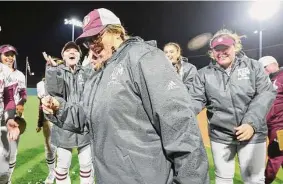 ?? Ethan Mito/Texas A&M ?? New Texas A&M softball coach Trisha Ford celebrates a victory over Tarleton at Davis Diamond in College Station in Ford’s first weekend as coach.