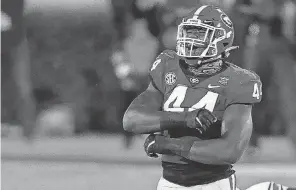  ?? JOSHUA L. JONES/ ATHENS BANNER- HERALD ?? Defensive lineman Travon Walker helped Georgia win the national championsh­ip and now will join the NFL as the No. 1 overall pick by the Jacksonvil­le Jaguars.