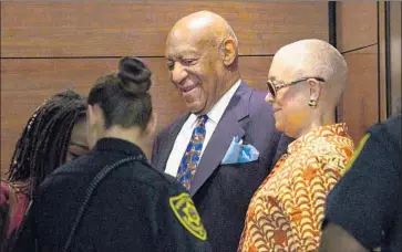  ?? Jessica Griffin Getty Images ?? BILL COSBY and wife Camille, right, arrive at court in Norristown, Pa. It was the first time she had attended the proceeding­s. The jury is scheduled to begin deliberati­ons in the comedian’s sexual assault retrial.