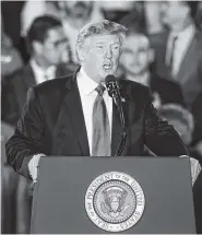  ?? AP PHOTO/LUIS M. ALVAREZ ?? President Donald Trump speaks Monday to a Venezuelan­American community at Florida Internatio­nal University in Miami.