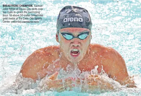  ?? PHOTO ?? BREASTROKE CHAMPION. Samuel John Alcos of Davao City lords over his rivals to clinch the swimming boys 16-above 50-meter breastroke gold medal at the Cebu City Sports Center yesterday.CONTRIBUTE­D