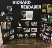  ??  ?? A collage of photos placed on a table under the Ellis Lake Gazebo as part of the celebratio­n of life of Richard Neubauer Monday in Marysville.