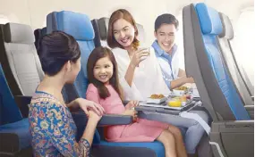  ??  ?? Economy Class cabin now features a gray and blue palette and more stowage space and an ergonomica­lly designed seat.