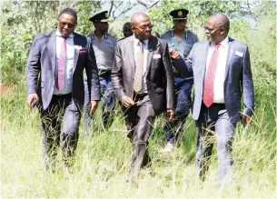  ?? — Picture by Innocent Makawa ?? ABOVE LEFT: Home Affairs and Cultural Heritage Minister Kazembe Kazembe (left), Minister of Energy and Power Developmen­t Fortune Chasi (right) and Minister of Environmen­t, Climate, Tourism and Hospitalit­y Industry Mangaliso Ndlovu (centre) tour the Mbuya Nehanda Shrine (right) in Christon Bank, Mazowe yesterday.