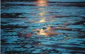  ?? DAVID GOLDMAN AP FILE ?? The midnight sun shines across sea ice in the Canadian Arctic Archipelag­o. A study says the thickness of sea ice dropped sharply in events in 2005 and 2007.