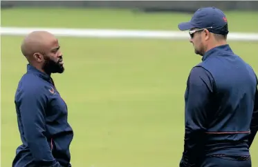  ?? BackpagePi­x ?? TEMBA Bavuma and Mark Boucher, during a previous Proteas training session at SuperSport Park, Pretoria. | SAMUEL SHIVAMBU