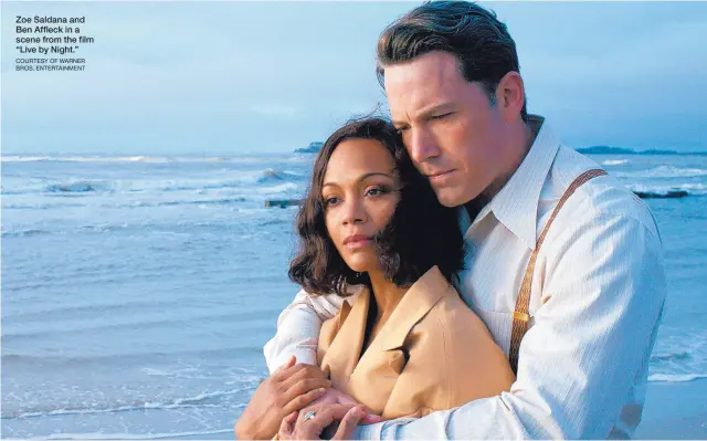  ?? COURTESY OF WARNER BROS. ENTERTAINM­ENT ?? Zoe Saldana and Ben Affleck in a scene from the film “Live by Night.”