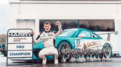  ??  ?? Harry King with his trophies after rounding off the season in style at Brands Hatch. Credit: Porsche GB