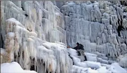  ??  ?? Iced water: Kinder Downfall in Derbyshire’s Peak District