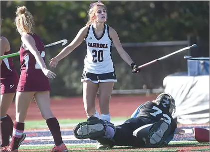  ?? PETE BANNAN - MEDIANEWS GROUP ?? Archbishop Carroll’s Sienna Golden (20) lets her frustratio­n show after a save by Mechanicsb­urg goalie Alexandra Bradley Tuesday in a PIAA Class 2A playoff loss for the Patriots.