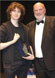  ??  ?? Best Youth Actor Ciaran Gilpin from East Glendaloug­h School with festival director William Mansefield.