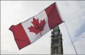  ?? REUTERS ?? A Canadian flag with a marijuana leaf on it is seen during the annual 4/20 marijuana rally in Ottawa last April.
