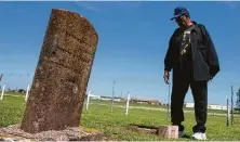  ?? Mark Mulligan / Staff photograph­er ?? Reginald Moore has been striving to get recognitio­n for the Old Imperial Farm cemetery that houses 95 laborers’ remains.