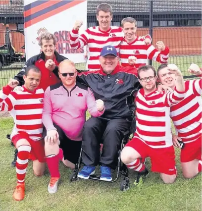  ?? Skem Men-aces players and coaches celebrate with their medals and trophies at Doncaster ??