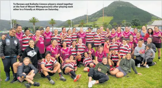  ??  ?? Te Rarawa and Kaikohe Lioness players stand together at the foot of Mount Whangataua­tia after playing each other in a friendly at Ahipara on Saturday.