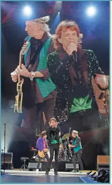  ??  ?? << The Rolling Stones perform in 2015.