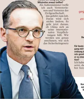  ??  ?? Kontrahent­en: Bundesauße­nminister Heiko Maas (l.) und Chinas Präsident Xi Jinping.