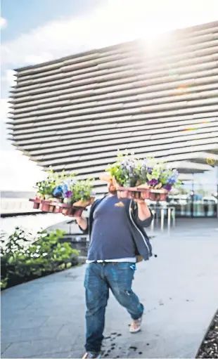  ??  ?? The exterior of the V&amp;A Dundee gets a pleasant floral display before welcoming media and dignitarie­s to the first look at its interior.