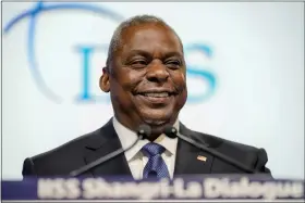  ?? VINCENT THIAN — THE ASSOCIATED PRESS ?? U.S. Secretary of Defense Lloyd J. Austin III smiles as he speaks during the 20th Internatio­nal Institute for Strategic Studies (IISS) Shangri-la Dialogue, Asia’s annual defense and security forum in Singapore, Saturday, June 3, 2023.