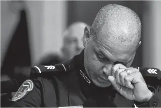  ?? JIM BOURG/POOL Getty Images ?? U.S. Capitol Police sergeant Aquilino Gonell wipe tears while testifying during the opening hearing of the U.S. House Select Committee investigat­ing white nationalis­ts’ Jan. 6 attack on the U.S. Capitol.