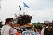  ?? Tim Clayton/Corbis via Getty Images ?? Spectators watch the relaunch of Mystic Seaport Museum’s flagship, the 1841 Whaleship Charles W. Morgan, at the Henry B. duPont preservati­on Shipyard in Mystic on July 21, 2013.