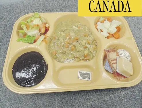  ??  ?? This photo of a food tray showing a typical federal prison meal was taken at Kent Institutio­n in Agassiz, B.C. The changeover to a “cook-chill system” has triggered many complaints about food quality from prisoners.