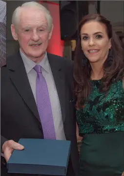  ??  ?? Bobby Dignam is inducted into the club’s hall of fame by Catriona Nolan.