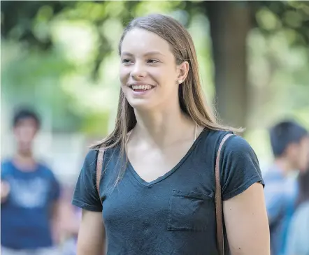  ?? POSTMEDIA FILES ?? Penny Oleksiak is getting used to balancing her swim training with school work.