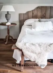  ??  ?? MAIN BEDROOM The Scandinavi­an-style scheme incorporat­es raw woods and a white palette.
Similar Optical white linen stone washed duvet cover, £114.99, Linenme. Luxurious sheepskin rug, £150, Nordic House, is a close match