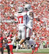  ?? JUSTIN CASTERLINE/GETTY IMAGES ?? Ohio State receivers Chris Olave and Binjimen Victor could worsen Wisconsin’s pain.