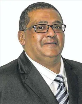  ?? Photo: Kopano TLAPE/GCIS ?? ‘A blanket of protection’: In 2004, six of controvers­y-shrouded businessma­n Roshan Morar’s (above) auditing firm staff were seconded to the Kwazulunat­al education department’s finance office on the instructio­n of Dr Cassius Lubisi (below). They never left.