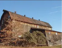  ??  ?? TOP An unused, dilapidate­d Pennsylvan­ia barn will be recycled as paneling, cabinets, and flooring.