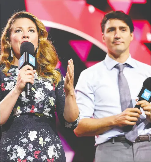  ?? MONICA SCHIPER / GETY IMAGES FOR WE DAY FILES ?? Sophie Grégoire Trudeau and Prime Minister Justin Trudeau speak at We Day New York in 2017 in New York City. The WE charity was selected by Trudeau’s government to deliver a $900-million federal student-grant program.