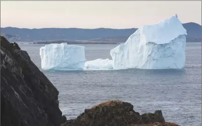  ?? CP PHOTO ?? A large iceberg is shown near Fermeuse, N.L., earlier this month.