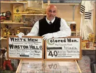  ?? Special to the Democrat-Gazette ?? David Pilgrim, founder of the Jim Crow Museum in Michigan, shows off some of his collection of racist memorabili­a. A traveling tour of memorabili­a opens Thursday at the Mosaic Templars Cultural Center in Little Rock.