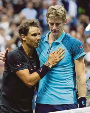  ?? EPA PIC ?? Rafael Nadal (left) and Kevin Anderson at the net after the US Open final on Sunday.