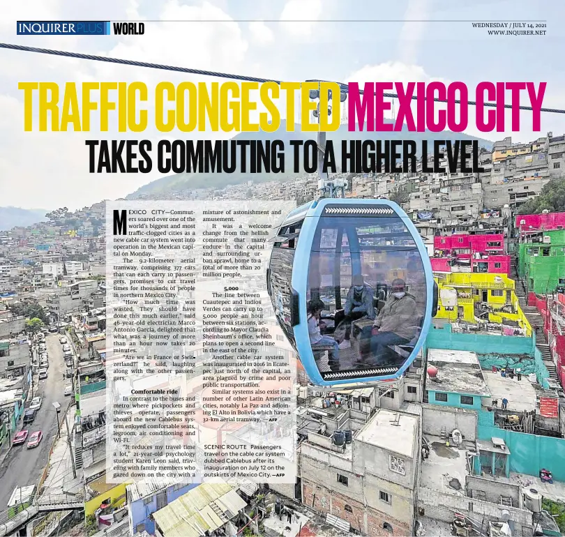  ?? —AFP ?? SCENIC ROUTE Passengers travel on the cable car system dubbed Cablebus after its inaugurati­on on July 12 on the outskirts of Mexico City.