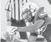  ?? WILLIE J. ALLEN JR./ ORLANDO SENTINEL ?? UCF wide receiver Brandon Johnson catches a pass during spring practice.