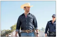  ?? NEW YORK TIMES / ACORN TV ?? Aaron Pedersen and Jada Alberts team up to solve a murder in the Outback in ‘Mystery Road.’