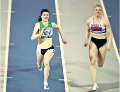  ??  ?? Charge: Amy Hunt (left) wins the British indoors 60m title at Glasgow’s Emirates Arena