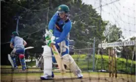  ??  ?? BRISBANE: Australia ‘A’ tour squad captain Usman Khawaja takes part in a cricket training session at Allan Border Field in Brisbane yesterday. — AFP