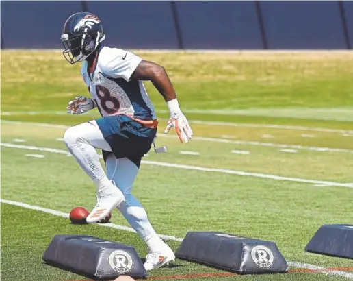  ?? Joe Amon, The Denver Post ?? Broncos linebacker Shaquil Barrett runs drills on the first day of mandatory minicamp Tuesday at Dove Valley.